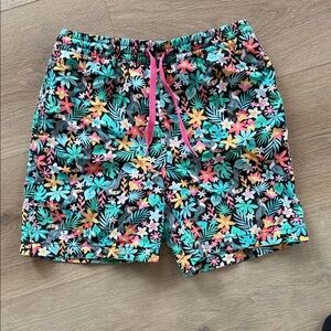 chubbies Black Tropical Floral Swim Shorts with Teal, Pink & Yellow Accents